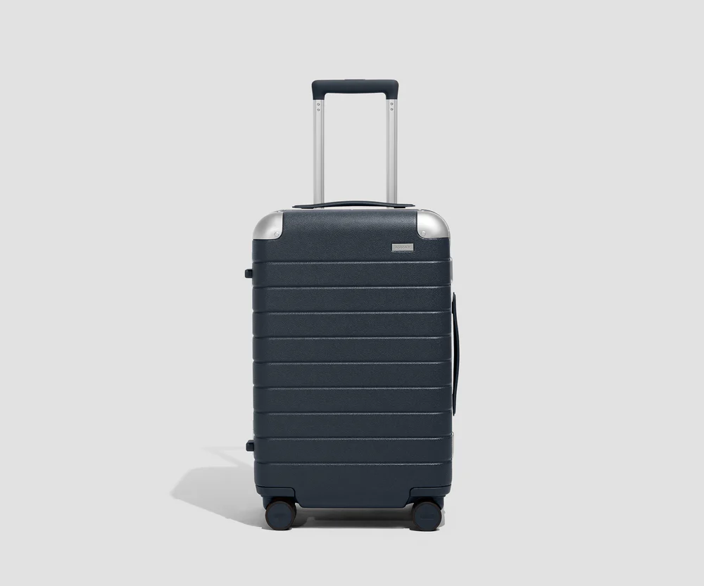 PDP_AluminumFrame_Navy_CAR_02 LiftyPack Aluminum Large Suitcase Navy Blue - Image 1